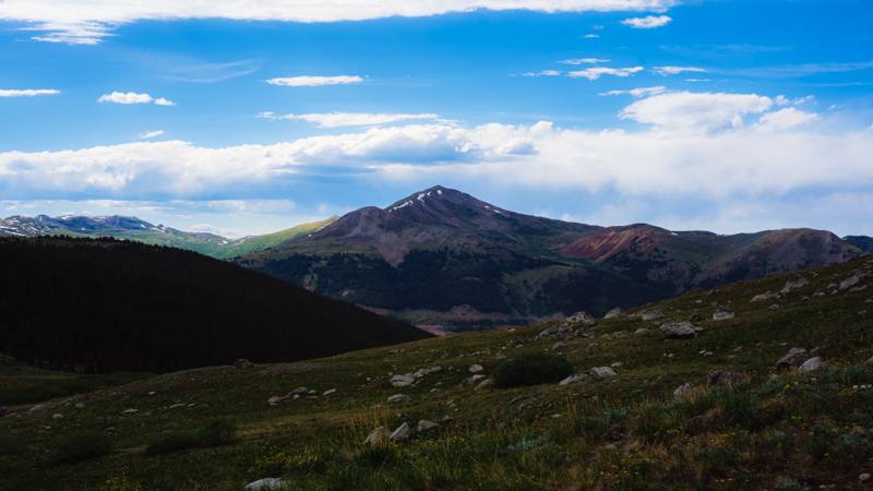 Alpine tundra and a distant peak above treeline in the Colorado backcountry