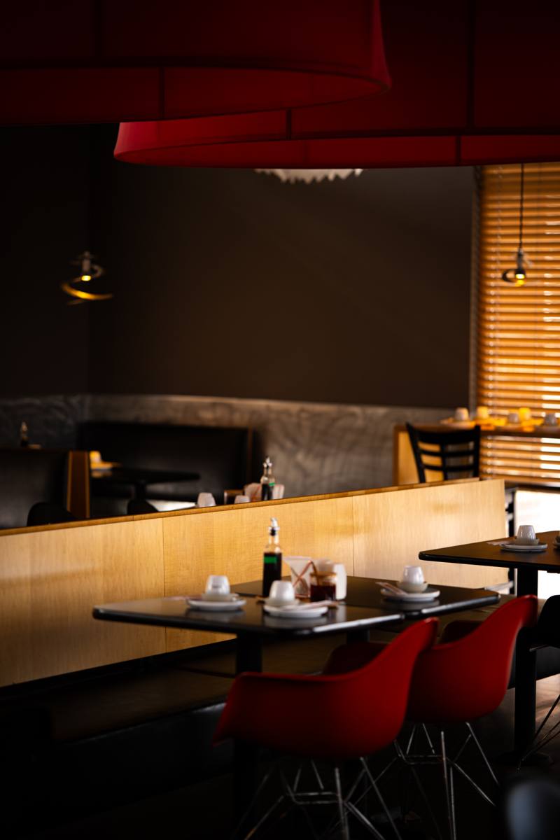 Interior of a Denver restaurant dining room at low light